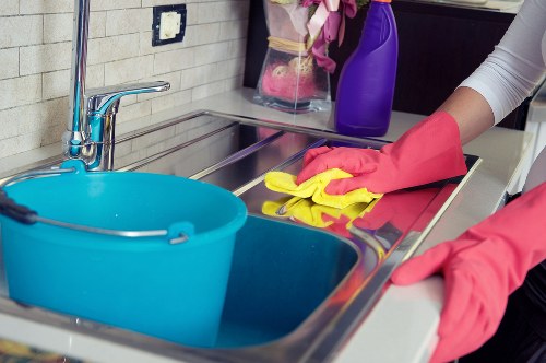 Cleaner in SW17 performing office cleaning in a workspace