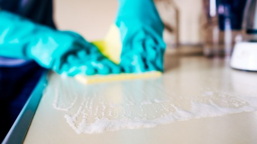 Commercial cleaning team maintaining an office in SW17